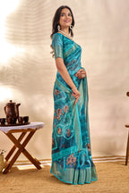 This elegant teal blue soft Saree