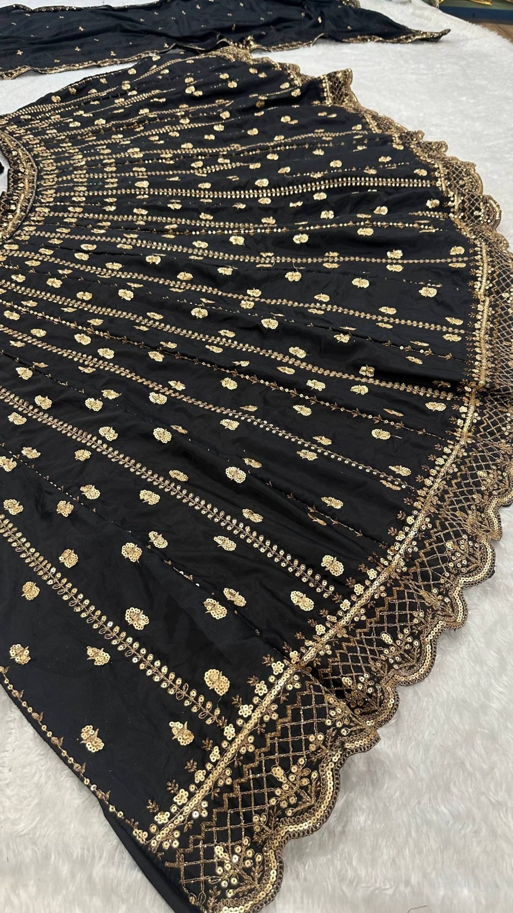 Gold Lehenga with Dupatta blouse and dupatta detail