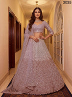 Pink Net Lehenga Choli with Sequins and Zari Embroidery For Bridal front view