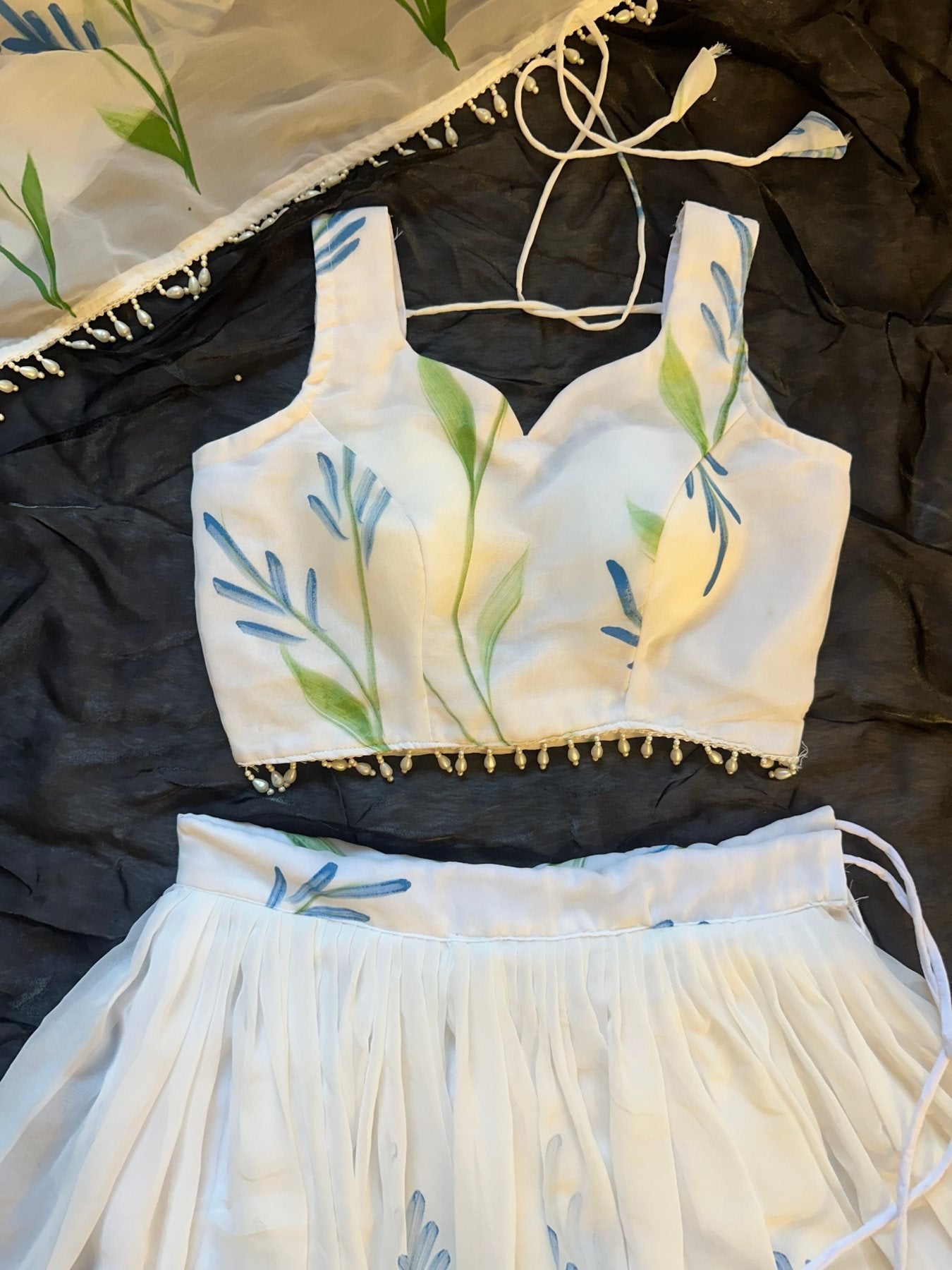 White Georgette Lehenga Choli with Hand Painted Floral Print full drape view