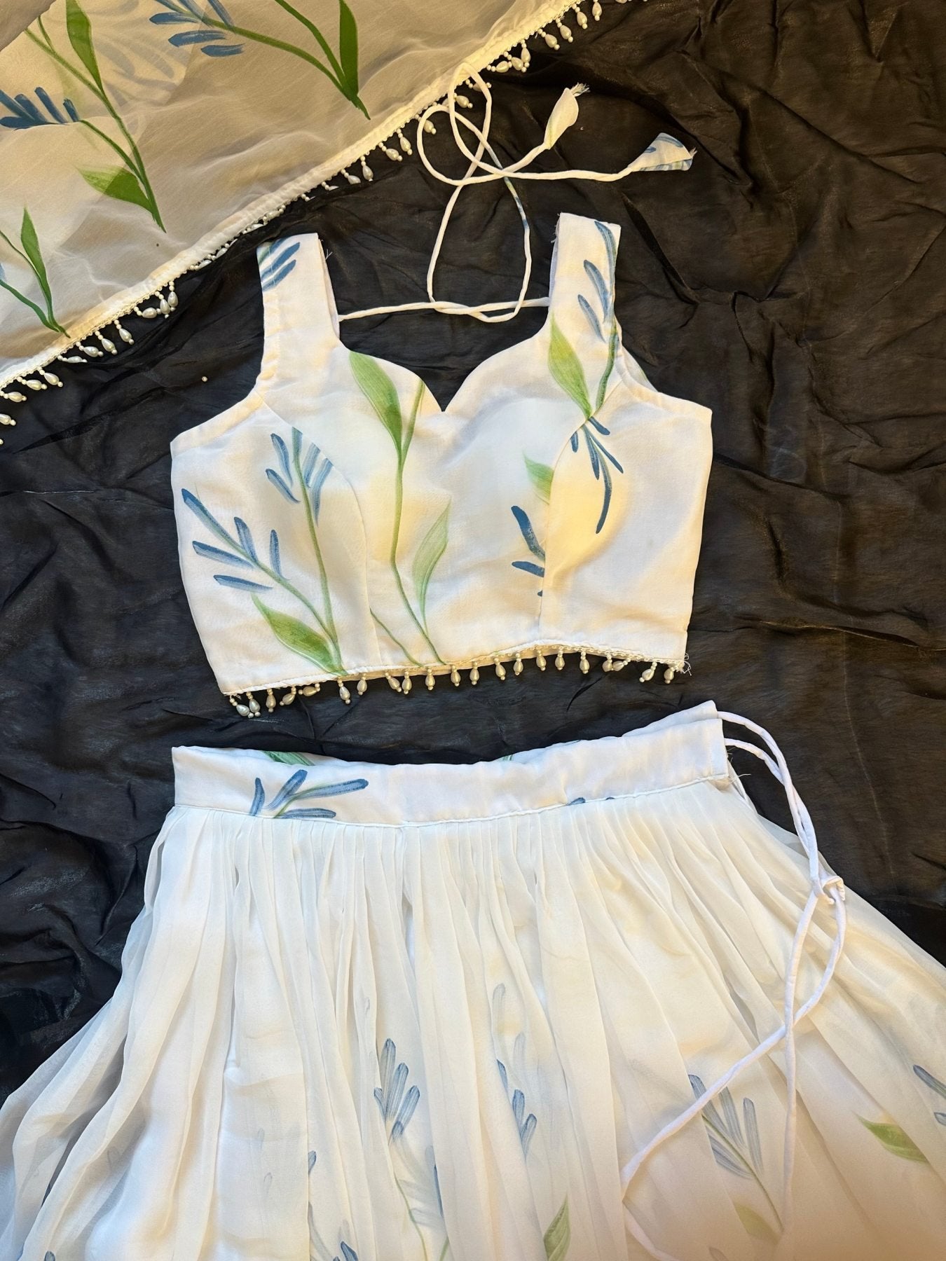 White Georgette Lehenga Choli with Hand Painted Floral Print embroidery close-up