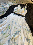 White Georgette Lehenga Choli with Hand Painted Floral Print fabric texture detail