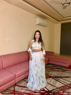 White Georgette Lehenga Choli with Hand Painted Floral Print full drape view