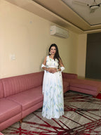 White Georgette Lehenga Choli with Hand Painted Floral Print back view