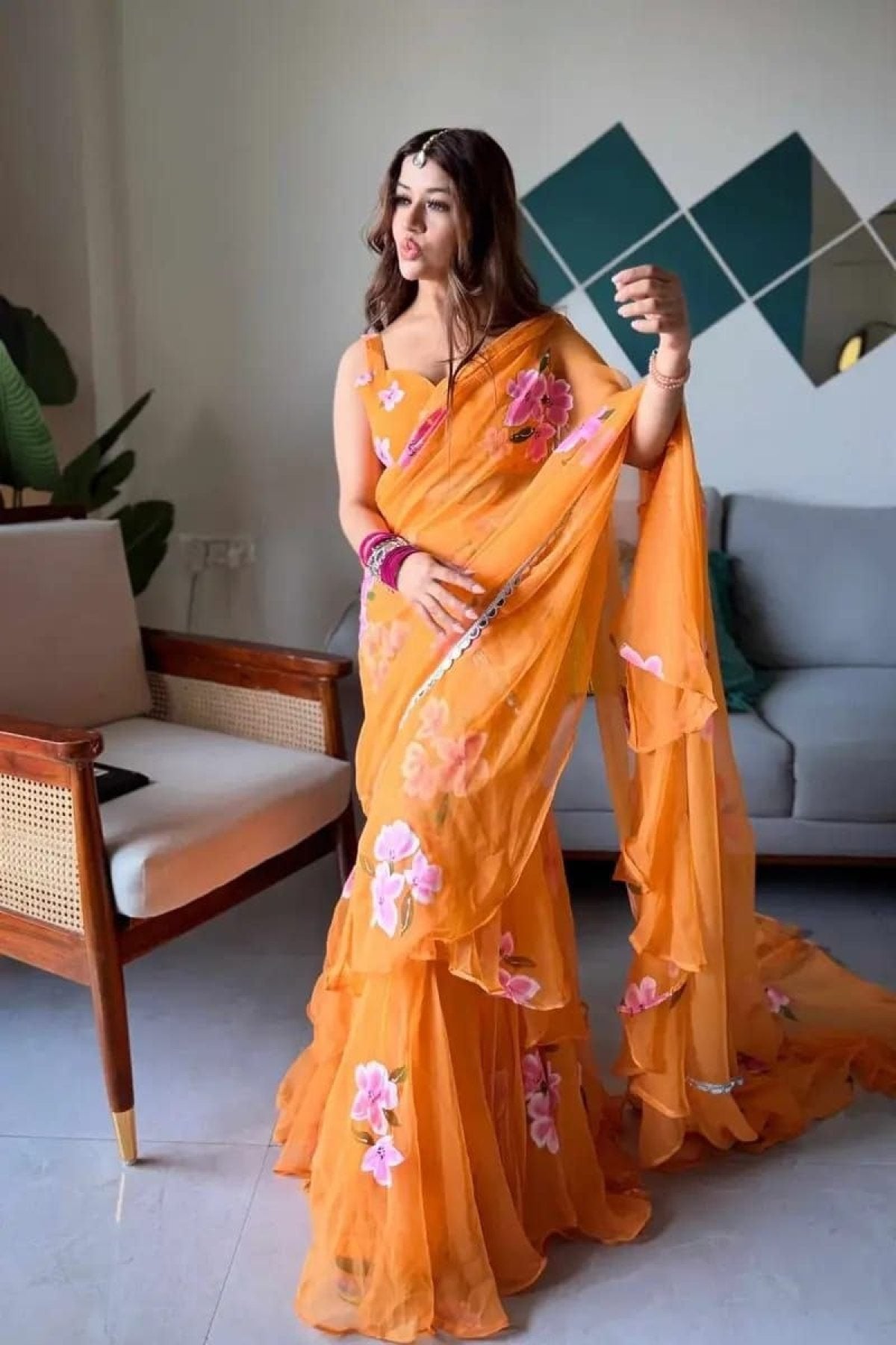 Orange Georgette Lehenga Saree with Real Mirror Lace for Wedding Functions back view