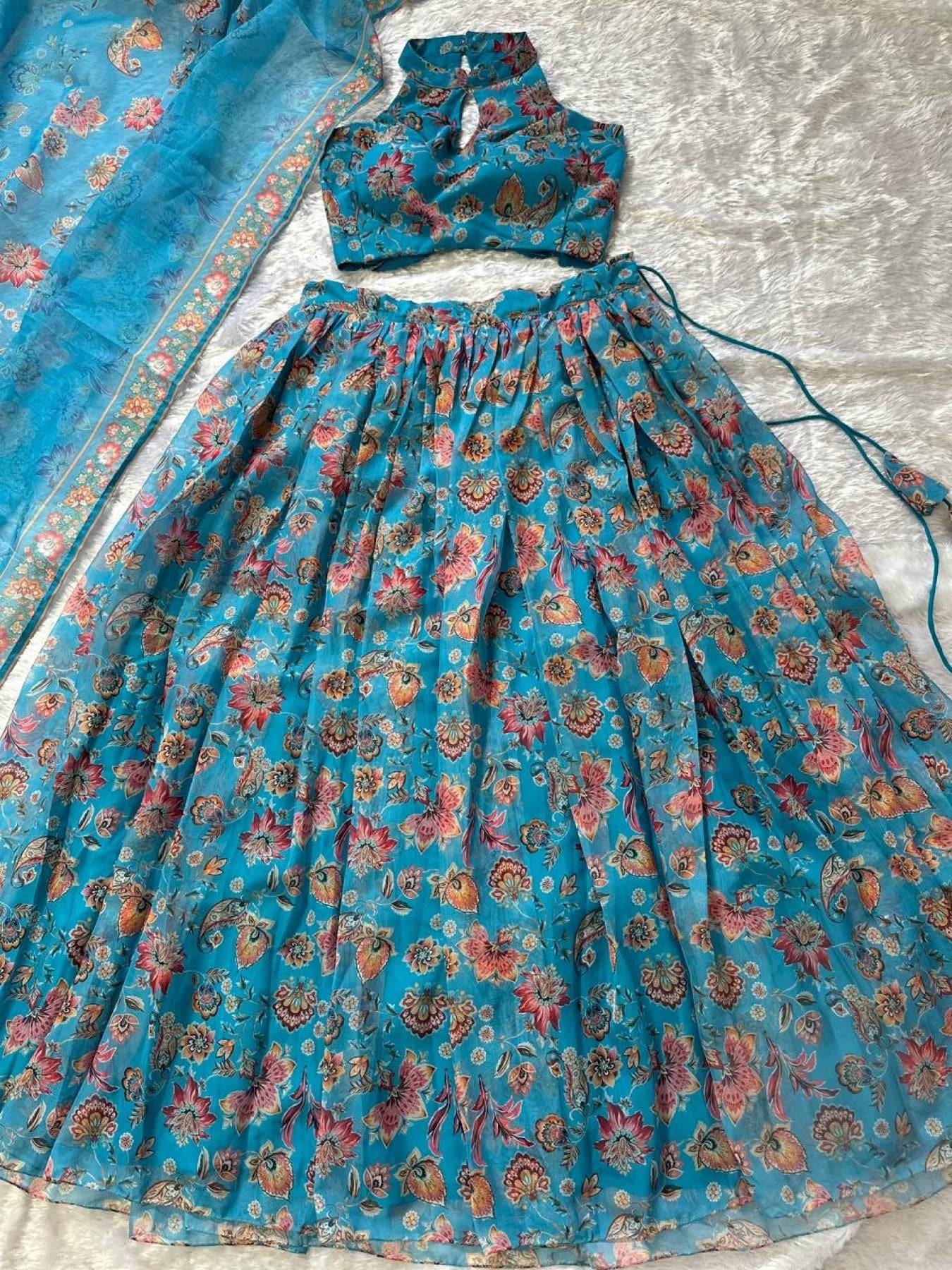 Blue Organza Floral Printed Lehenga with Halter Neck Blouse for Party Wear fabric texture detail