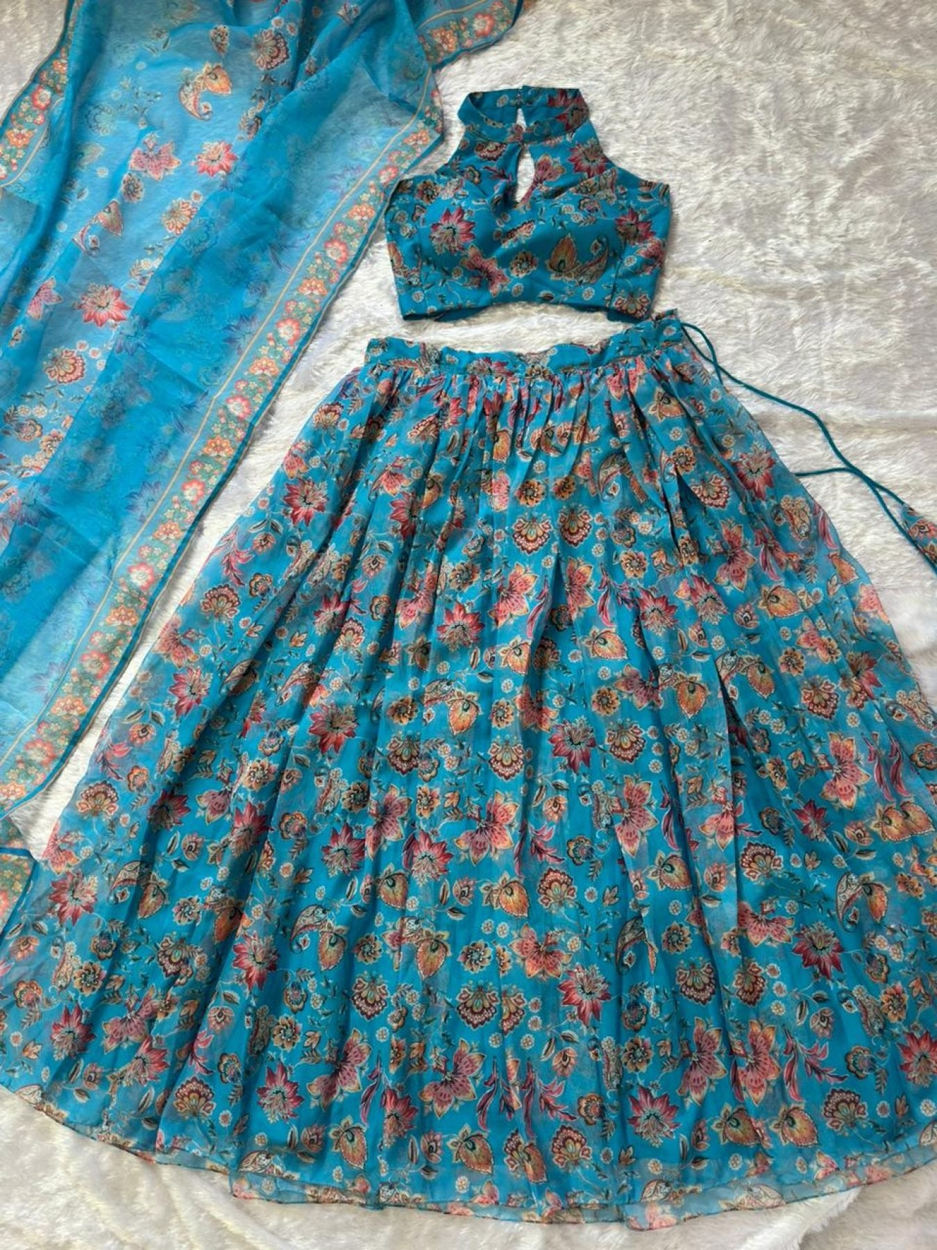 Blue Organza Floral Printed Lehenga with Halter Neck Blouse for Party Wear front view