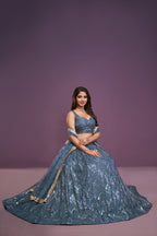 Blue Perfect Net Real Mirror Work Lehenga Choli with Zari Embroidery for Wedding fabric texture detail