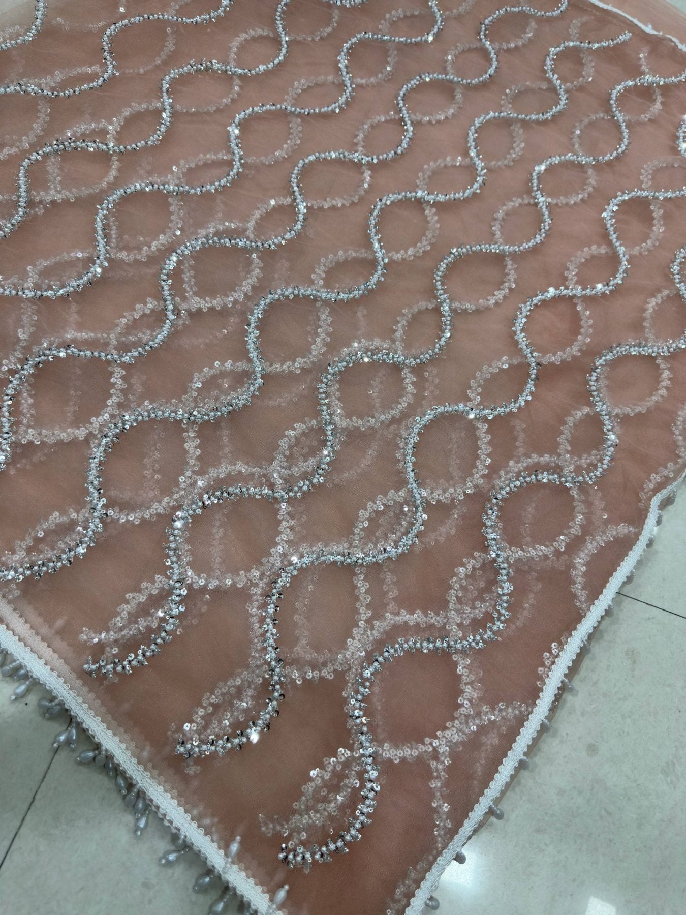 Peach Net Saree - Embroidery pallu design detail