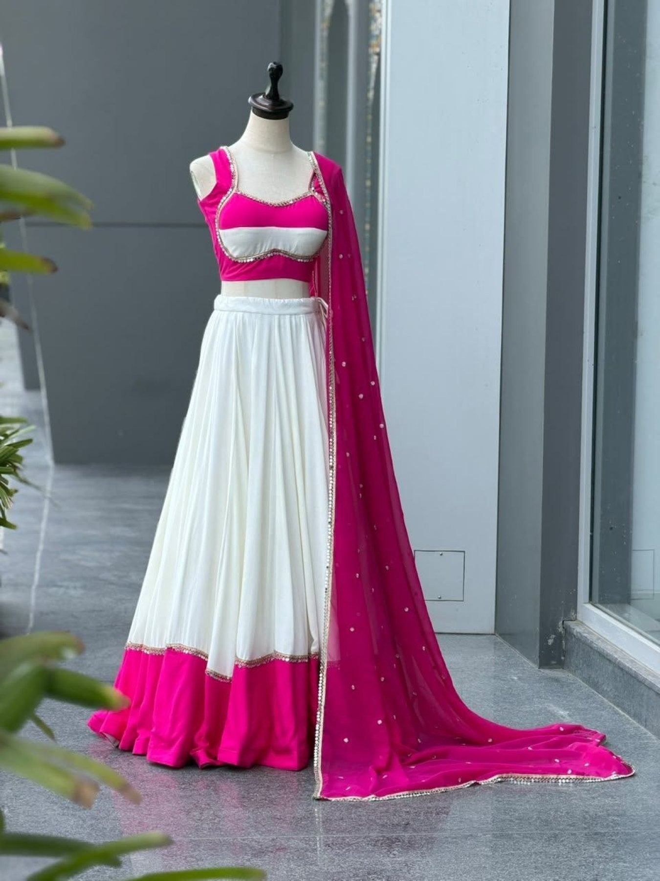 Pink White Cotton Party Wear Lehenga Choli with Heavy Mirror Work Lace back view