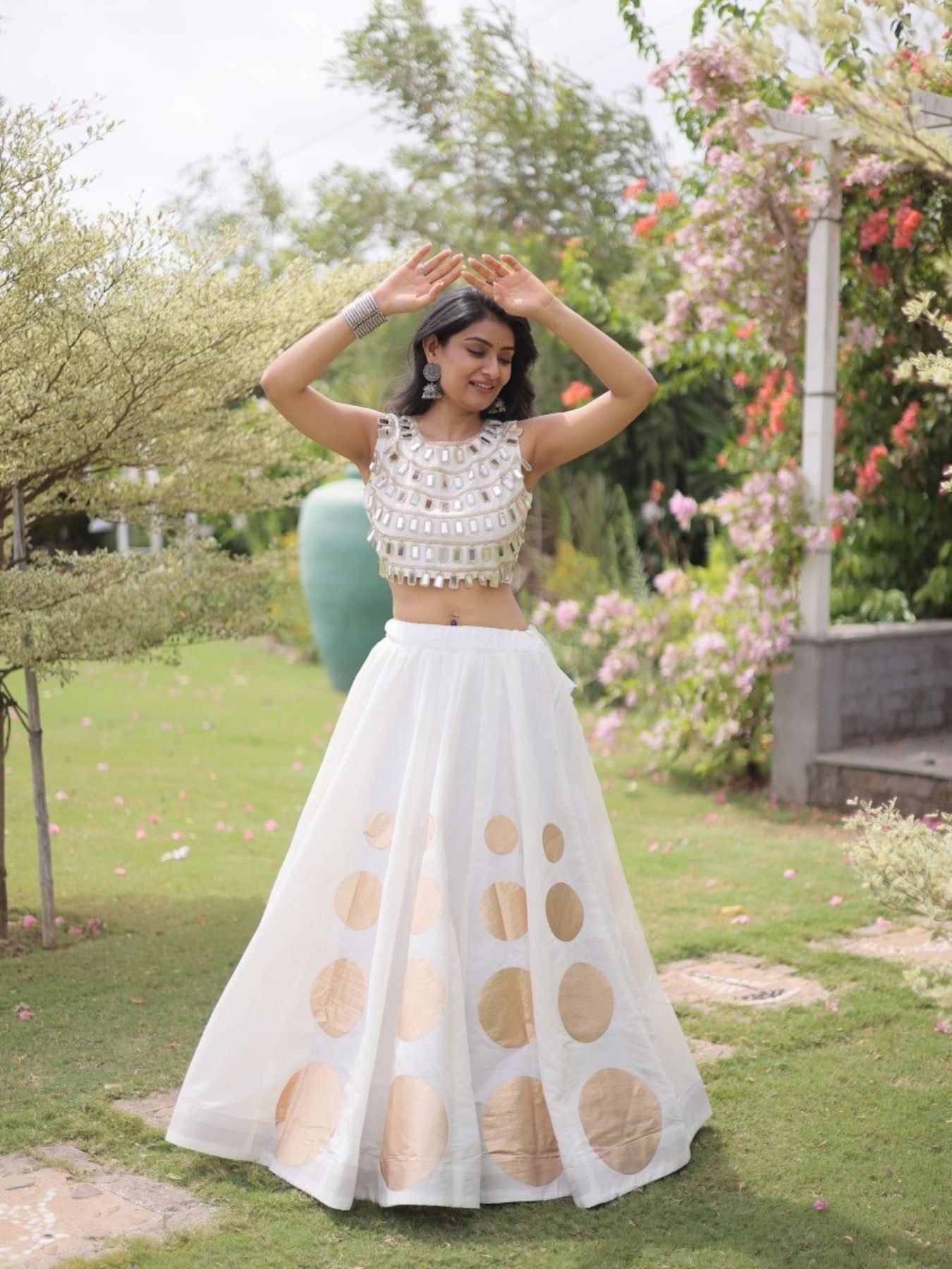 Roman Silk Navratri Lehenga Choli with Mirror Lace Work and 6 Meter Flair styling view
