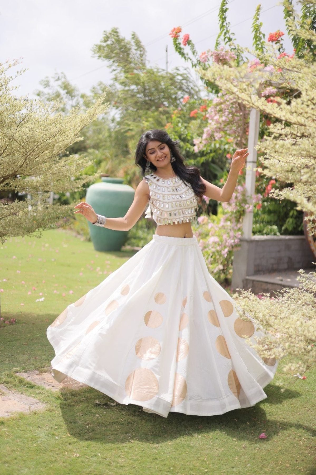 Roman Silk Navratri Lehenga Choli with Mirror Lace Work and 6 Meter Flair styling view