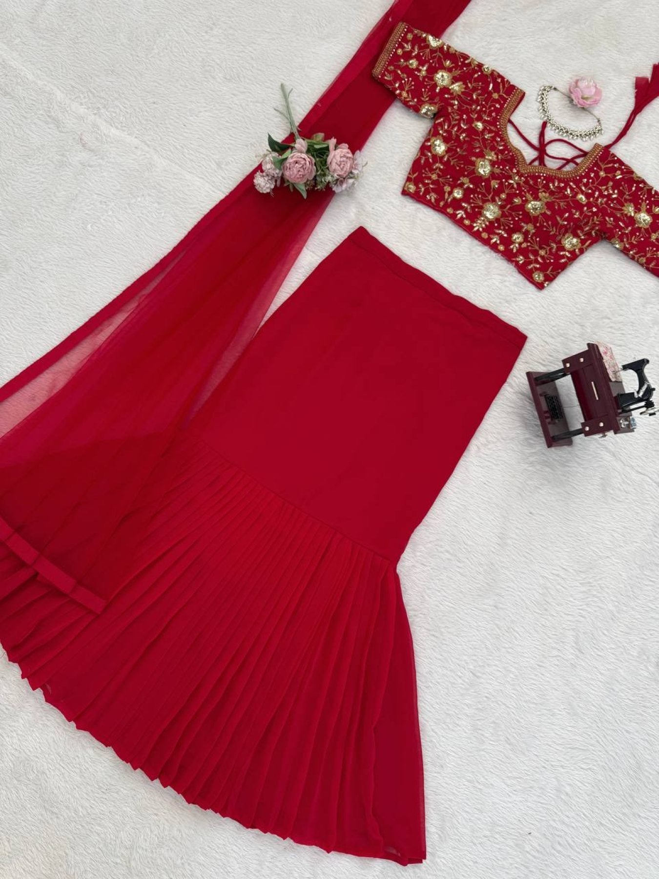 Red Faux Georgette Lehenga Choli With Sequence Work fabric texture detail