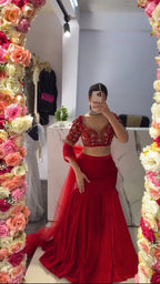Red Faux Georgette Lehenga Choli With Sequence Work fabric texture detail