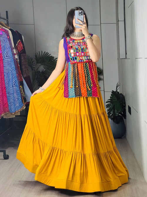 Yellow Rayon Chaniya Choli with Mirror Work and Latkan Dori at Snyvia