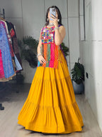 Yellow Rayon Chaniya Choli with Mirror Work and Latkan Dori Lehenga blouse and dupatta detail
