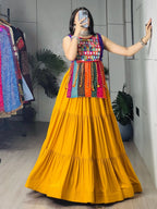 Yellow Rayon Chaniya Choli with Mirror Work and Latkan Dori Lehenga fabric texture detail