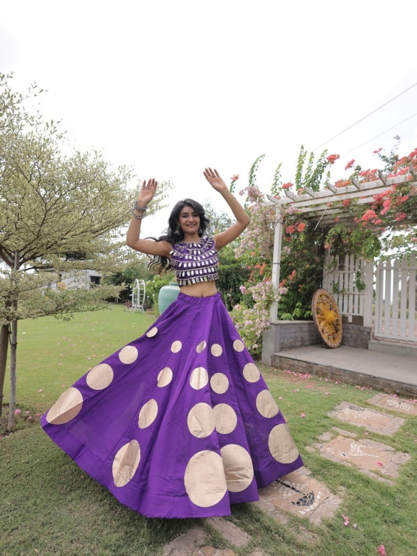 Roman Silk Navratri Lehenga Choli with Mirror Lace Work and 6 Meter Flair fabric texture detail