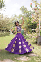Roman Silk Navratri Lehenga Choli with Mirror Lace Work and 6 Meter Flair fabric texture detail