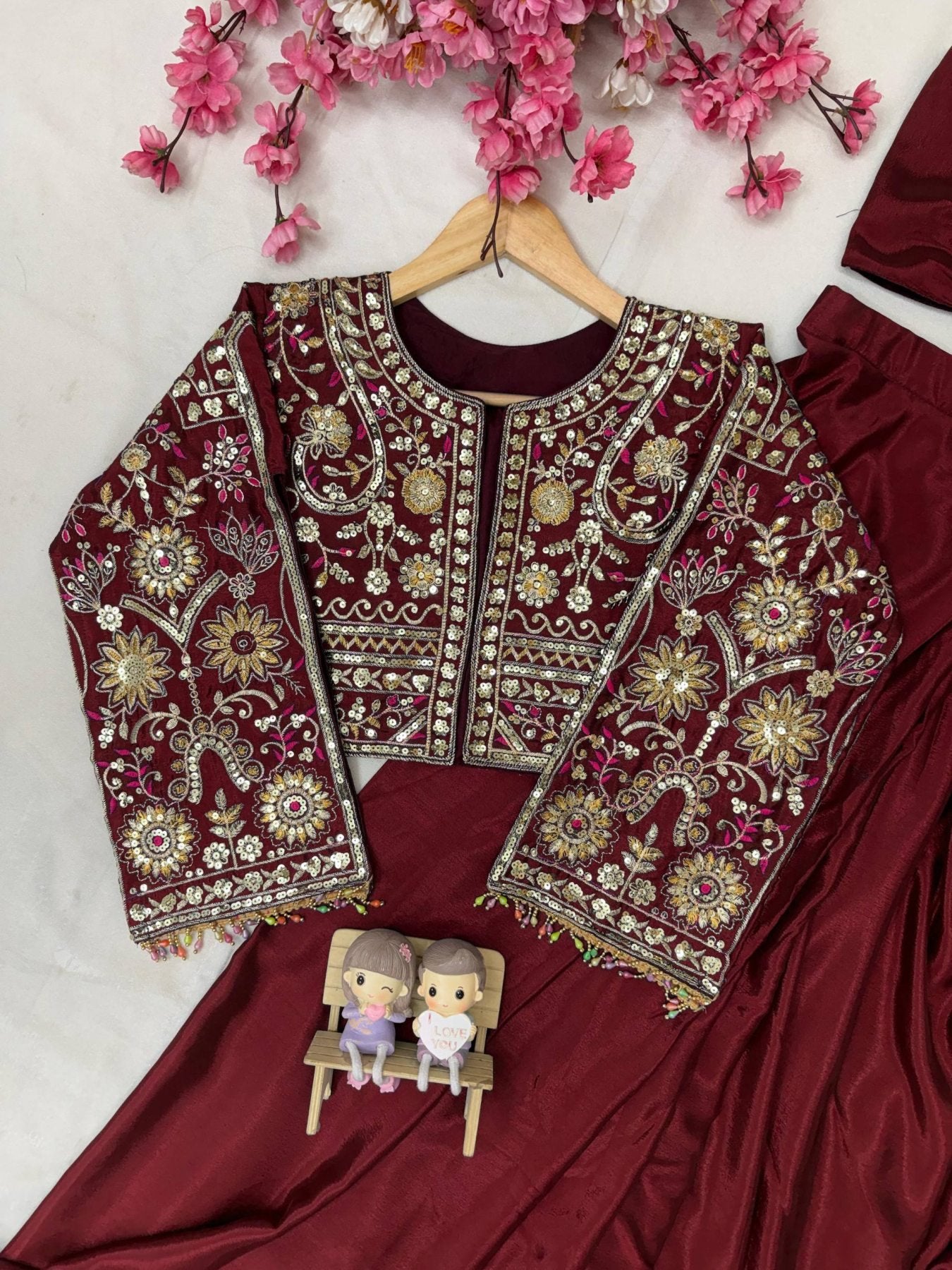 Lycra Drape Saree with Embroidered Silk Jacket Lehenga back view