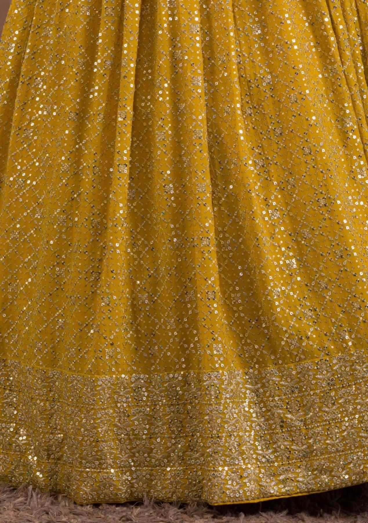 Georgette Lehenga Choli with Zari and Multiple Sequins Embroidery Work fabric texture detail