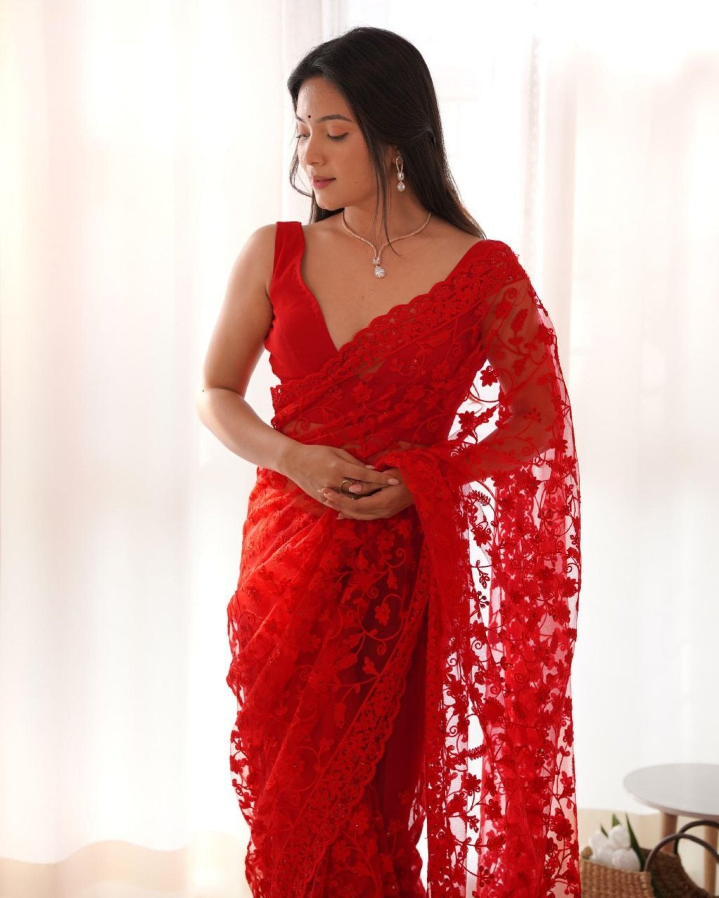 Red Net Saree - drape and pallu detail